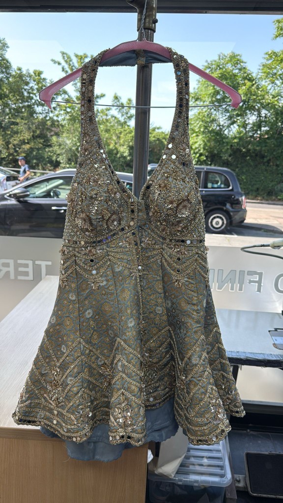 Delicate embellished dress, dry cleaned
